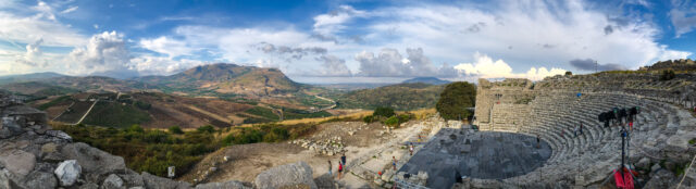 A panoramic shot of the theatre at Segesta taken from the seating area looking out towards the valley.